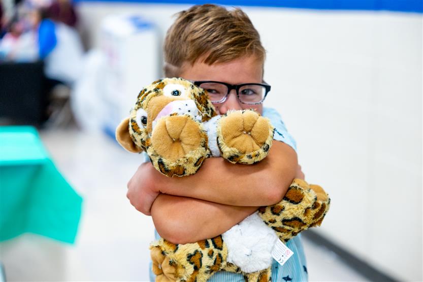 Students build a cheetah at a community event
